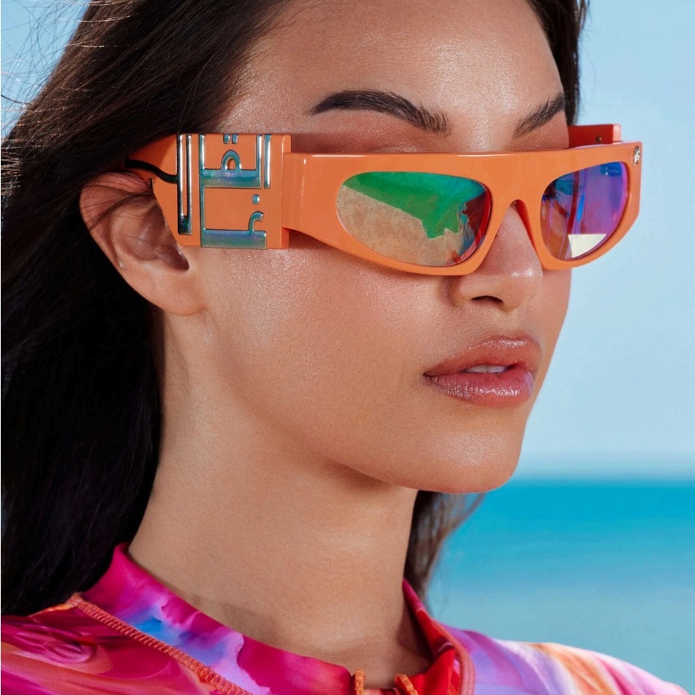 Sporty Orange Sunglasses with Futuristic Design